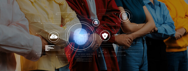 A diverse group of individuals stands together with arms crossed, symbolizing unity and trust in...