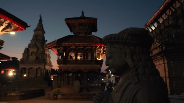 Bhaktapur Durbar Square with illuminated temples and sculptures by night. Kathmandu Valley, Nepal