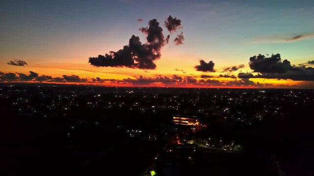 Sunset over Kuta Selatan, Bali with colorful sky and silhouette