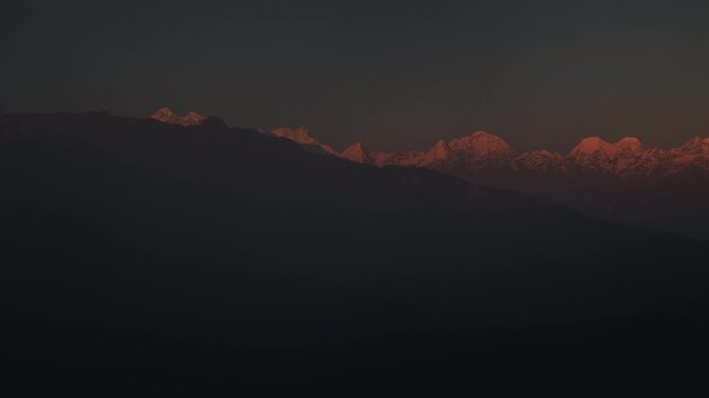Sunset view from Kalinchowk, Dolakha showcases Himalayan peaks: Annapurna, Lamjung, Manaslu, Ganesh Himal, Langtang, Dorjee Lakpa, Gauri Shanker, and others in golden light.