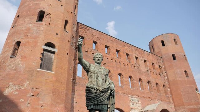 Caesar statue in front of Palatine Gate in Turin