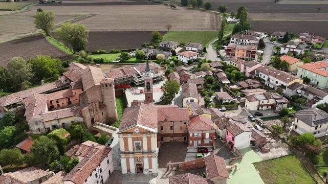 Aerial view of Calendasco village with historic castle and church in Piacenza, Italy