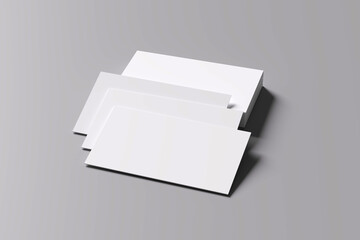 Empty business cards stacked on black and white background.