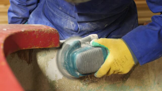 Repairing old fiberglass boat sanding transom using orbital sander