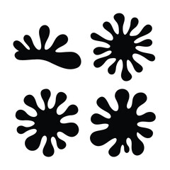 Set of four abstract black ink splatter or paint splash shapes on a white background