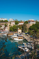Fototapeta premium View of the Old Town Antalya Marina and tour boats in Kaleici