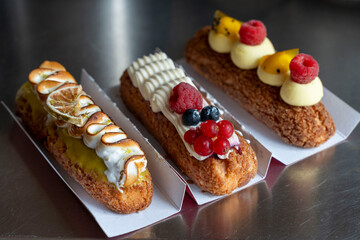 Three Gourmet &Eacute;clairs with Berry and Passion Fruit Flavors