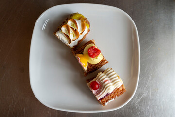 Sharing Eclairs on one plate for all to taste together