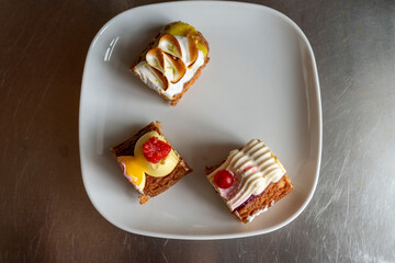 Sharing Eclairs on one plate for all to taste together