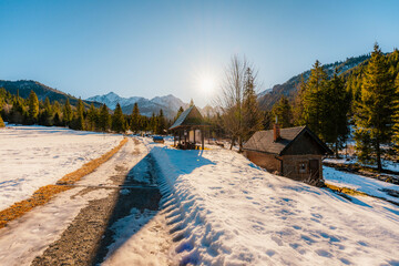 Mountain view with hiking path in Javorova dolina nature reserve during a winter sunny day in Slovakia in High Tatras mountains © Zedspider
