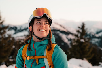 Mountaineer backcountry ski walking ski alpinist in the mountains. Ski touring in alpine landscape with snowy trees. Adventure winter sport. Low Tatras, slovakia