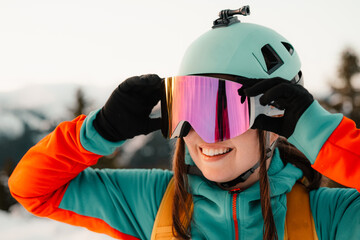 Mountaineer backcountry ski walking ski alpinist in the mountains. Ski touring in alpine landscape with snowy trees. Adventure winter sport. Low Tatras, slovakia