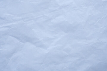 Obraz premium Abstract Wrinkled Pale Blue Paper Surface for Design Backdrop