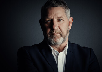Fototapeta premium Professional, portrait and corporate with business man as investment banker, pride and about us. Portfolio manager, confidence and serious with mature person on studio background for opportunity