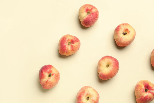 Sweet fig peaches on yellow background