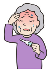 体温計を持ち、発熱している高齢者の女性