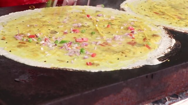 Preparation of Masala dosa  a dish of South India.