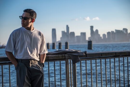 Man looking over the Hudson river in Manhattan