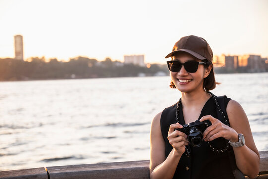 woman enjoying sunset at the Hudson river