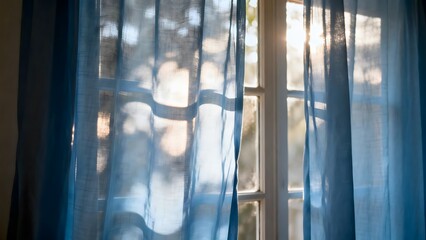 SunlitWindowBlueCurtains