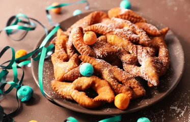 Fotobehang Eten bugne angel wings, traditional french sweet food and carnival decoration  © M.studio