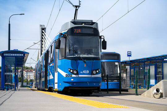 Rotax EU8N type tram wagon at Dworzec Płasz&oacute;w Estakada stop in Cracow. MPK Krak&oacute;w Public Transport blue tramway in Cracow on May 12, 2024 in Krakow, Poland.