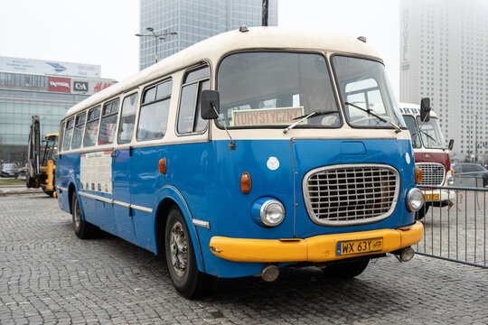 Jelcz 043 vintage bus, nicknamed Og&oacute;rek or Cucumber. Old classic Polish autobus on plac Defilad Parade Square, used as sightseeing Retro Bus Tour of city on March 24, 2025 in Warsaw, Poland.