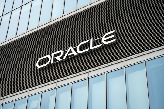Oracle Corporation logo sign on the Warsaw HUB office building. American multinational computer technology and software company. Signboard with brand logotype on March 24, 2025 in Warsaw, Poland.