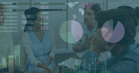 Leading speaker gesturing while team in shirts and blouses at meeting table, with charts and laptop