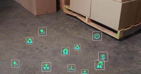 Displaying pallet with cardboard boxes on concrete warehouse floor, showing green icons, copy space