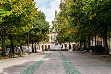 Paseo de Pablo Sarasate Pasalekua with Monumento a los Fueros at its end in Pamplona, Spain