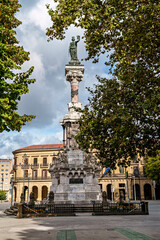 Paseo de Pablo Sarasate Pasalekua with Monumento a los Fueros at its end in Pamplona, Spain