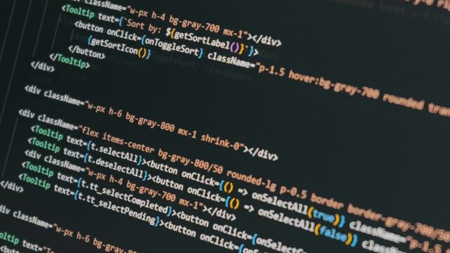 Colorful programming code scrolls on a dark monitor showing modern React syntax and functions. Concept of vibe coding, AI assisted software development, and creating applications with machine learning