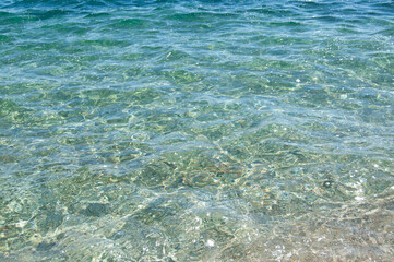 Blue water in the sea. Transparent seawater background.