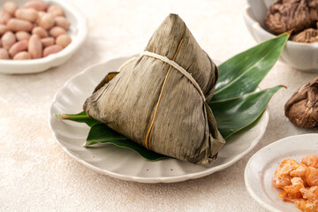 Zongzi, rice dumpling for Dragon Boat Festival on white table background.