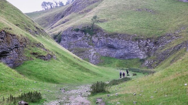 People Walking Up The Path In The Distance At Cave Dale, Castleton Video