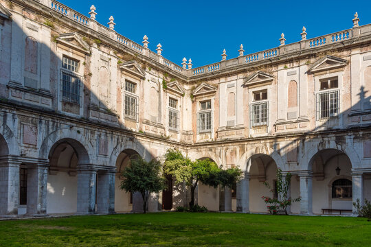 Sunlight and Shadows in the Neoclassical Cloister of a Historic European Monastery, Convento da Gra&ccedil;a (Convent of Our Lady of Grace) in Lisbon, Portugal.