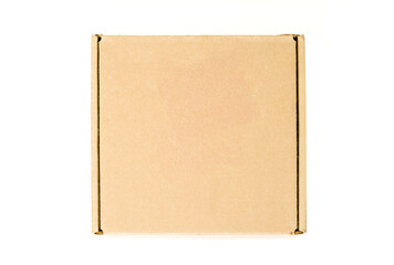 Light brown corrugated cardboard box isolated on white background. Top view. Plain packaging, rounded edges, no labels or logos.
