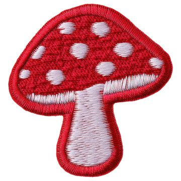 Red mushroom patch embroidered with white spots, playful textile badge with texture