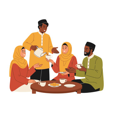 Group of People Wearing Traditional Clothing Sitting Together.