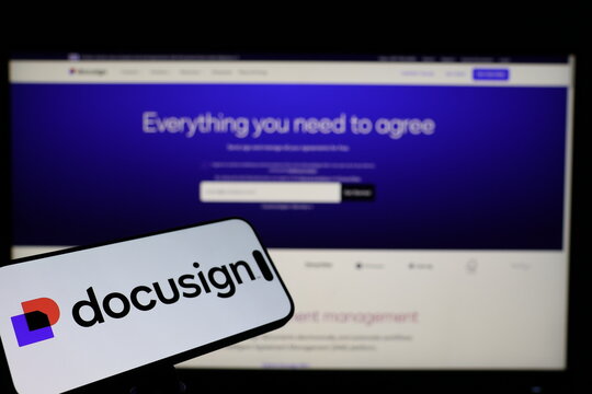 Kiel, Germany - 02-04-2026: Smartphone displaying US e-signature software company DocuSign logo in front of companys webpage