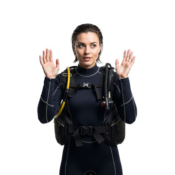 Intrigued female diver with hands up conveying a question or surrender
