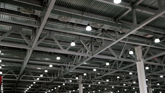 Industrial warehouse ceiling showing metal beams structure