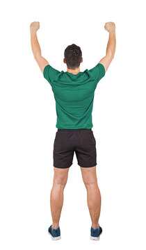 Full length rear view portrait of a victorious man athlete raises hands celebrating success. Victory and triumph concept. Winning sporty guy isolated on transparent background, achievement celebration