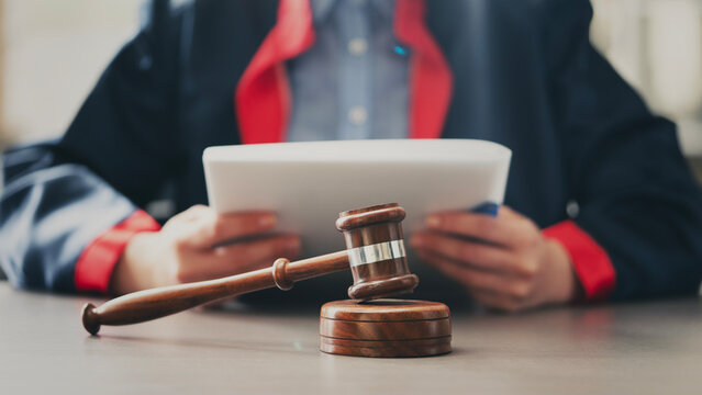 The judge working on legal document