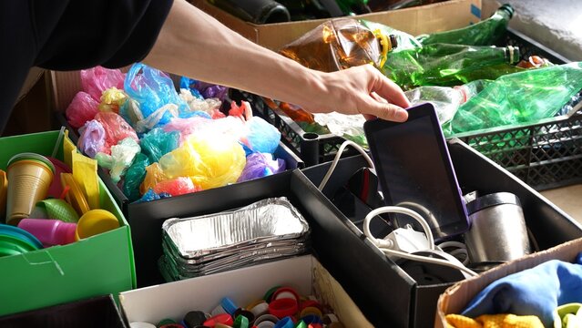 E-waste. Broken mobile phones are disposed of a recycling centres