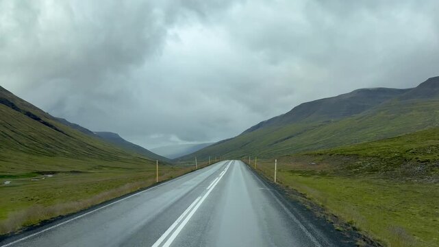 POV Driving on Iceland's Ring Road (Route 1) through Lush Green Mountain Valley