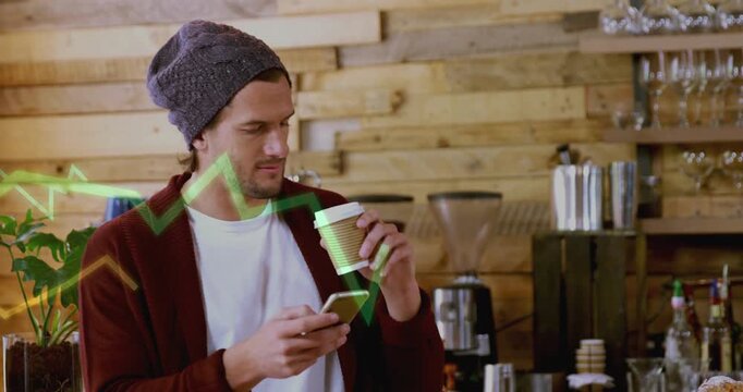 Man tapping phone while sipping coffee in cafe, moving green chart crossing face showing analytics