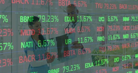 Viewing staff in scrubs and lab coat reviewing tablet in corridor, with stethoscope, ticker overlay © vectorfusionart