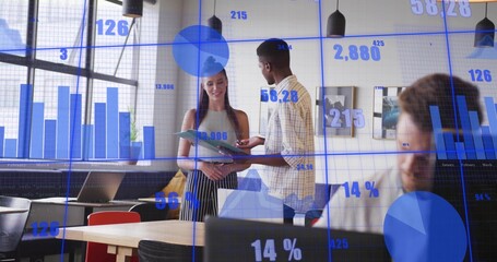 Exchanging duo in plaid shirt, striped top sharing folder at office with laptop and blue overlay